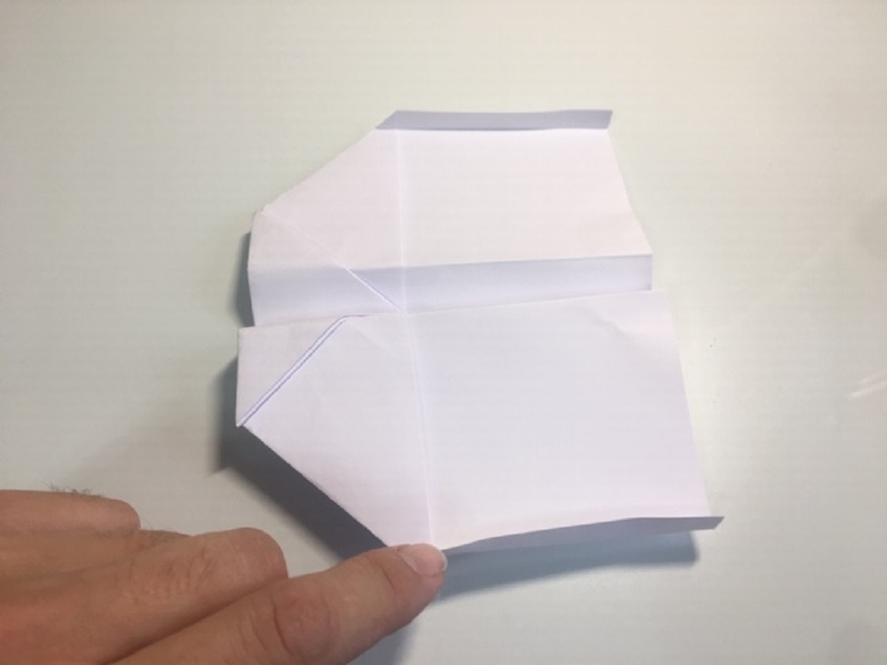 hacer una avión de papel